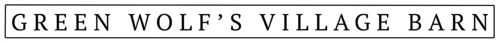 green wolf's village barn banner logo