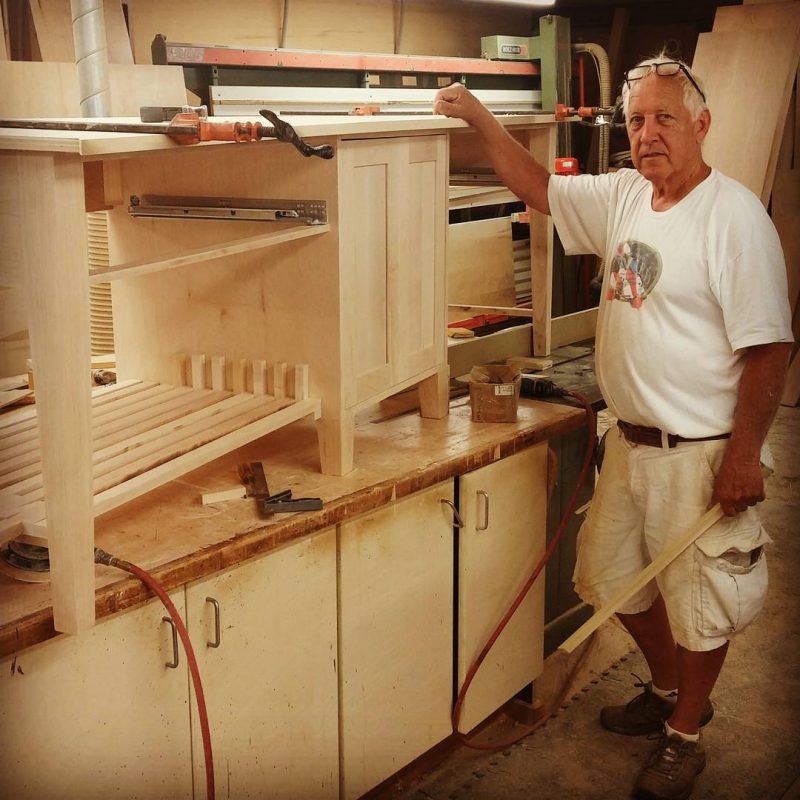 Cabinetmaker Harry Wolf owner of Fox and Wolf, Inc. specializing in fine custom cabinets and woodworking